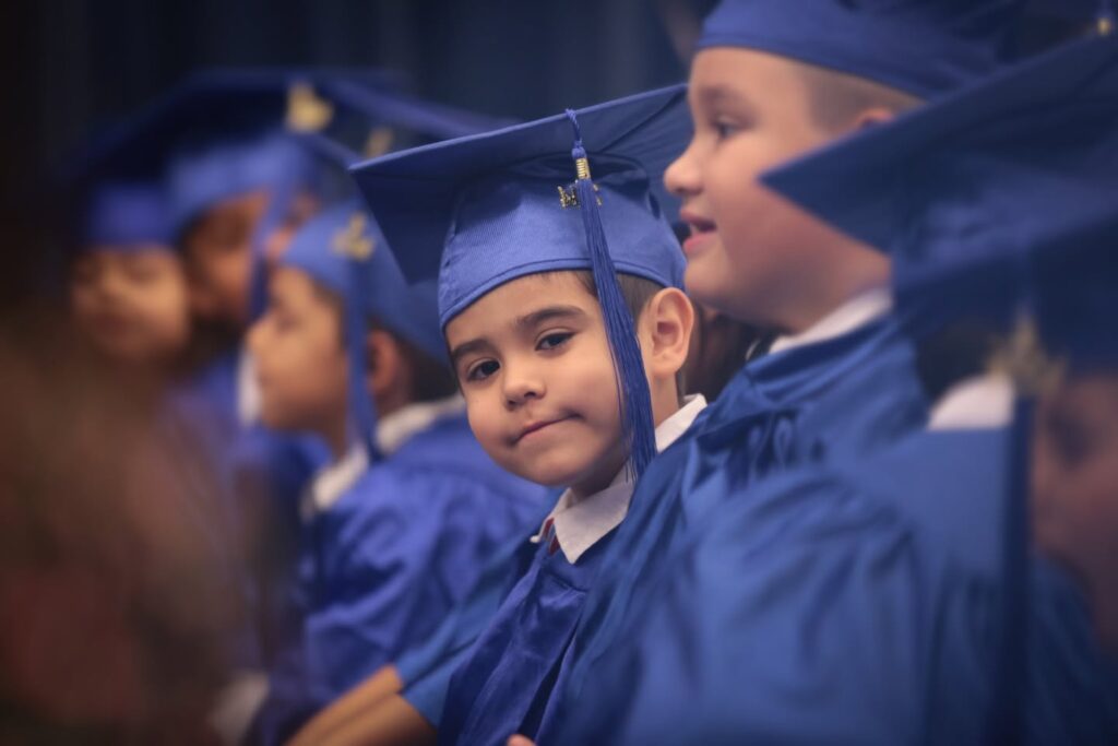 Kindergarten graduation portrait with blue cap and gown Bryan Elementary Mission Texas